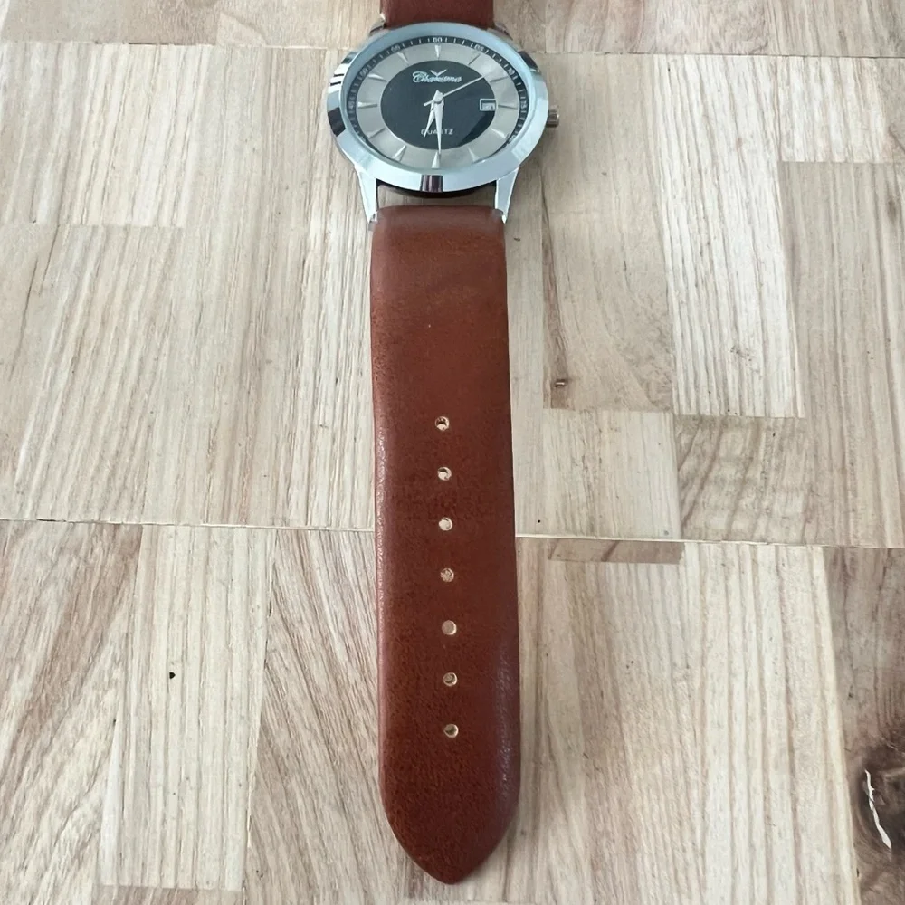 Charisma mens silver tone brown leather dress watch NEW BATTERY